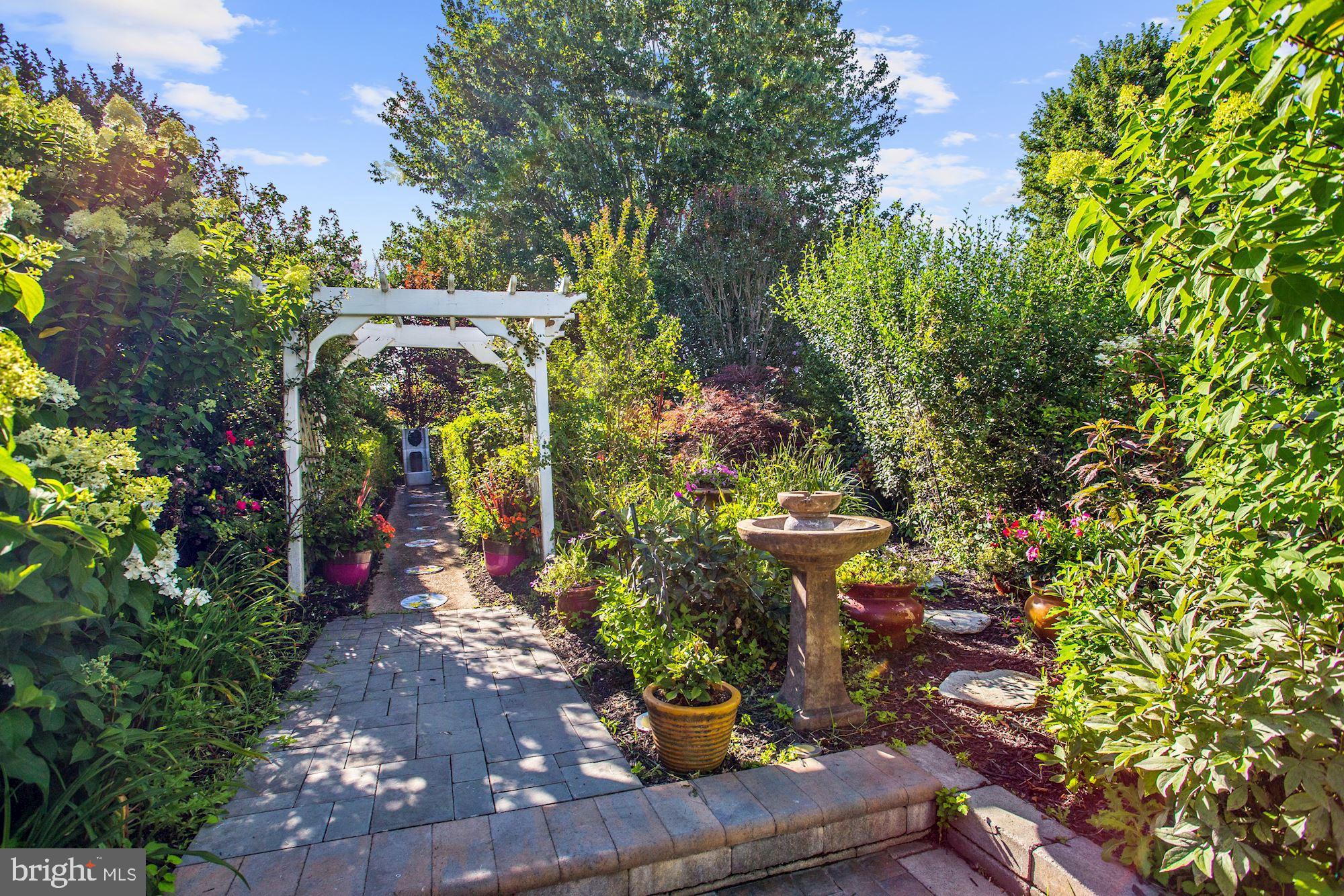 9466 Lovat Road Fulton, MD 20759 - Photo 69 of 78 Rose Covered Trellis to HIdeaway English Garden