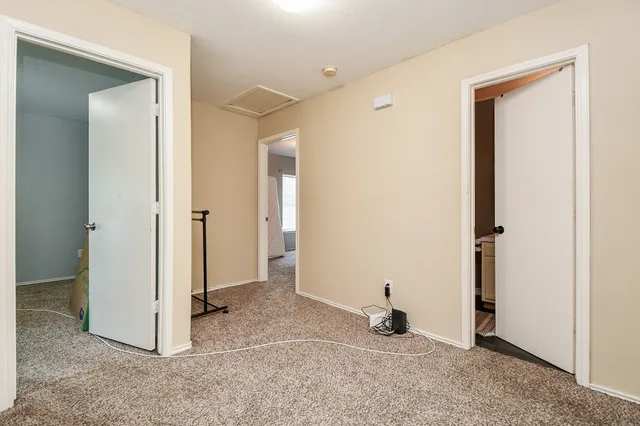a view of a livingroom with a flat screen tv