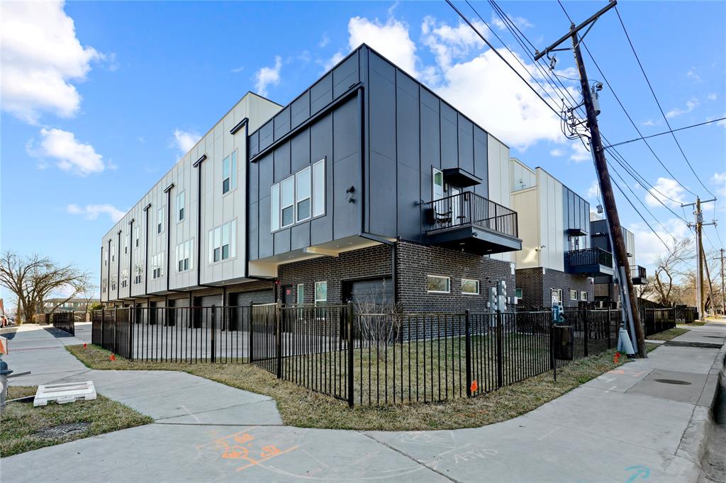 7207 Mohawk Drive, Unit B 3 Dallas, TX 75235 - Photo 1 of 19 a view of street along with house and trees