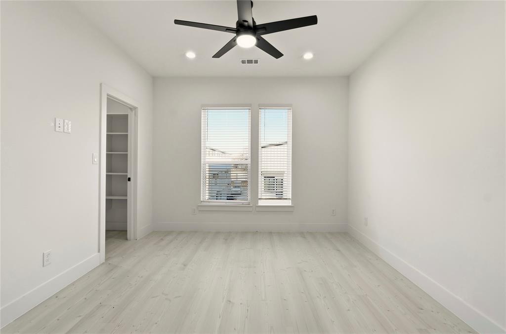 7207 Mohawk Drive, Unit B 3 Dallas, TX 75235 - Photo 12 of 19 an empty room with a window