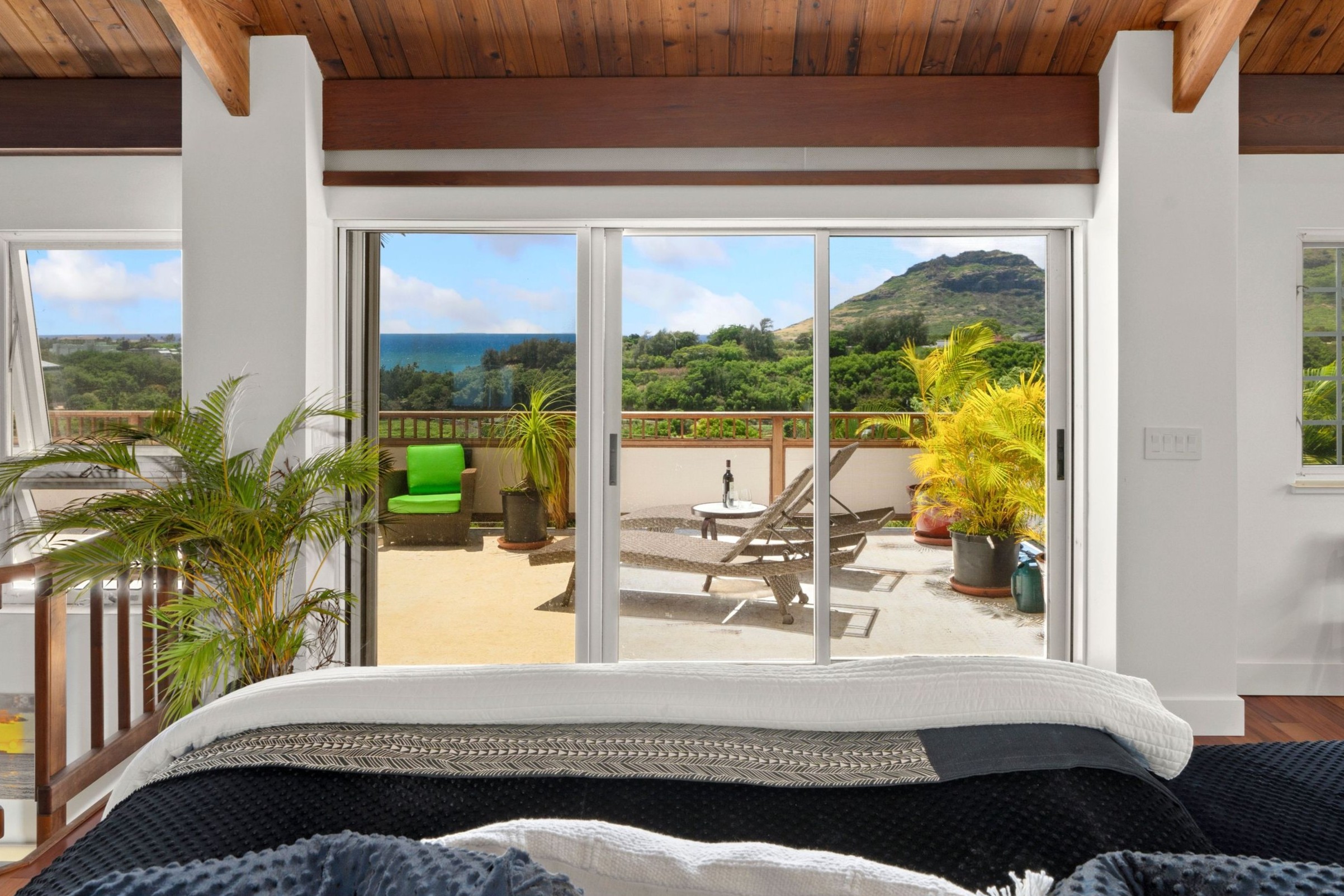 2938 Mokoi Street Lihue, HI 96766 - Photo 12 of 30 a living room with a couch and a large window