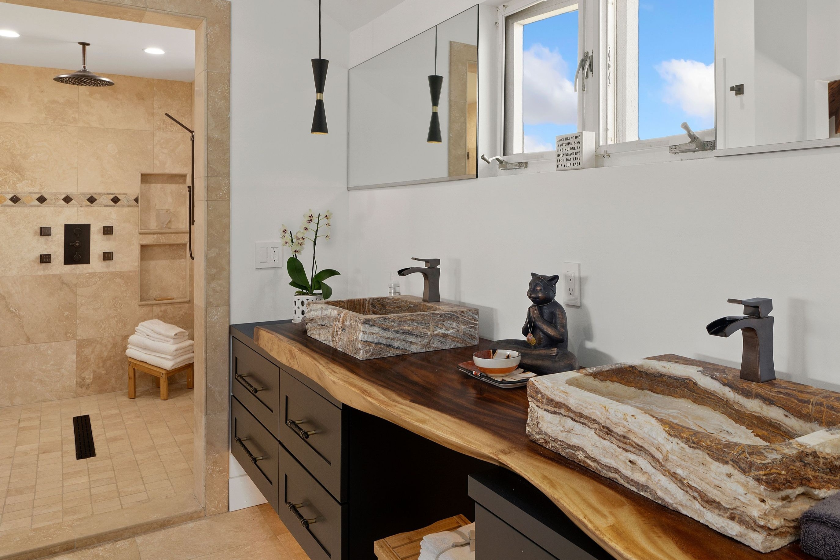 2938 Mokoi Street Lihue, HI 96766 - Photo 13 of 30 a kitchen with sink stove and cabinets