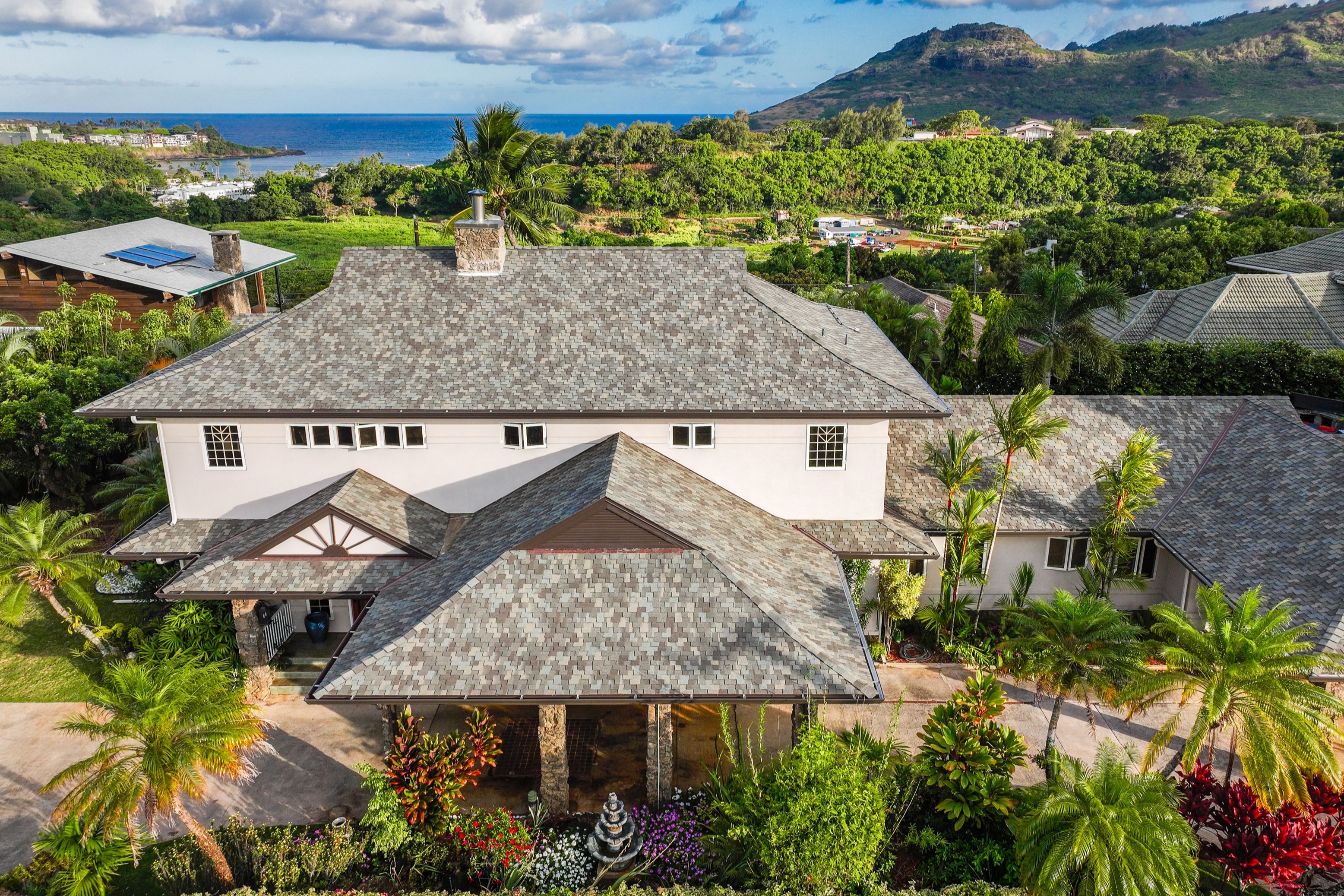 2938 Mokoi Street Lihue, HI 96766 - Photo 2 of 30 an aerial view of a house with yard and outdoor seating