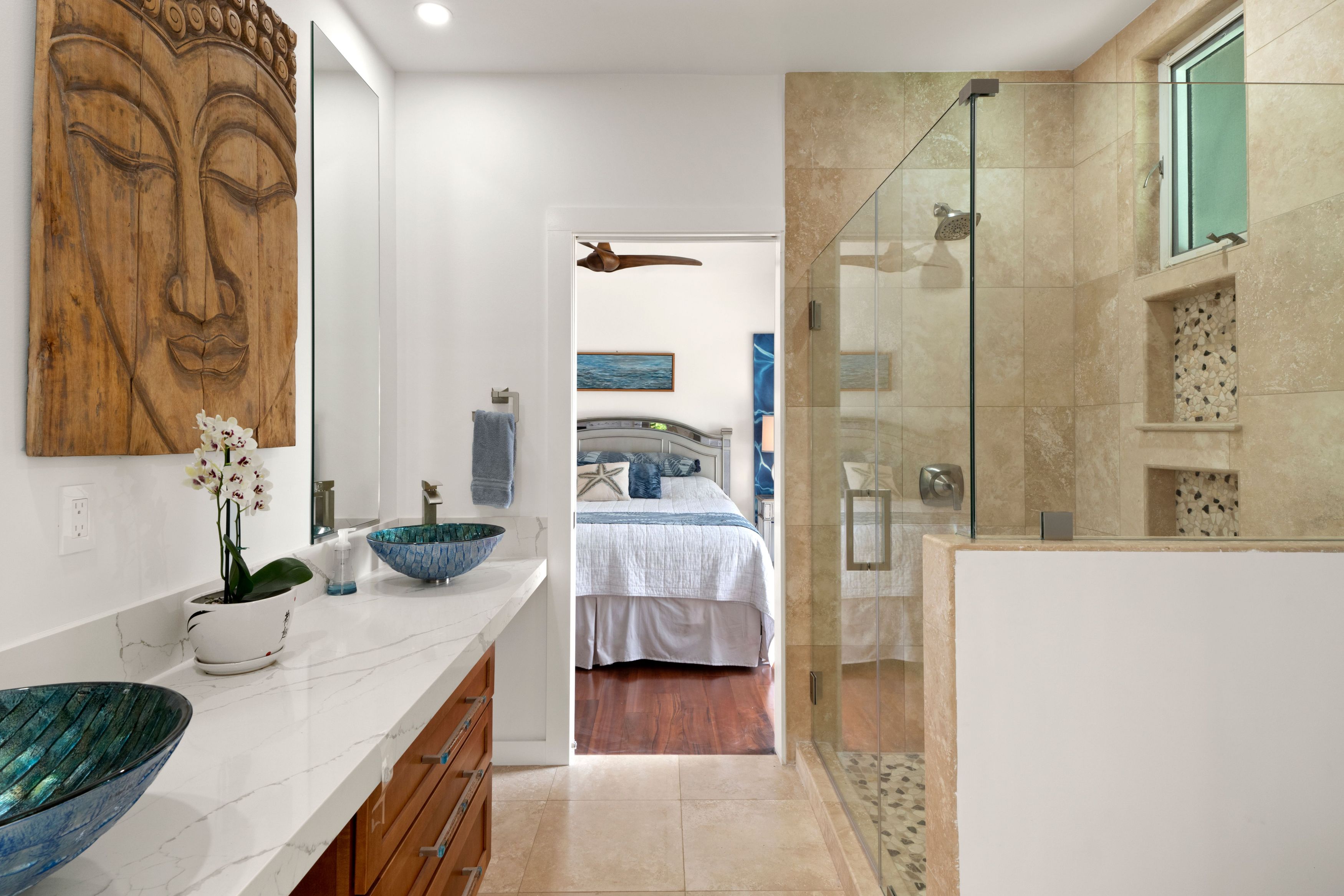 2938 Mokoi Street Lihue, HI 96766 - Photo 22 of 30 a bathroom with a granite countertop tub sink and shower