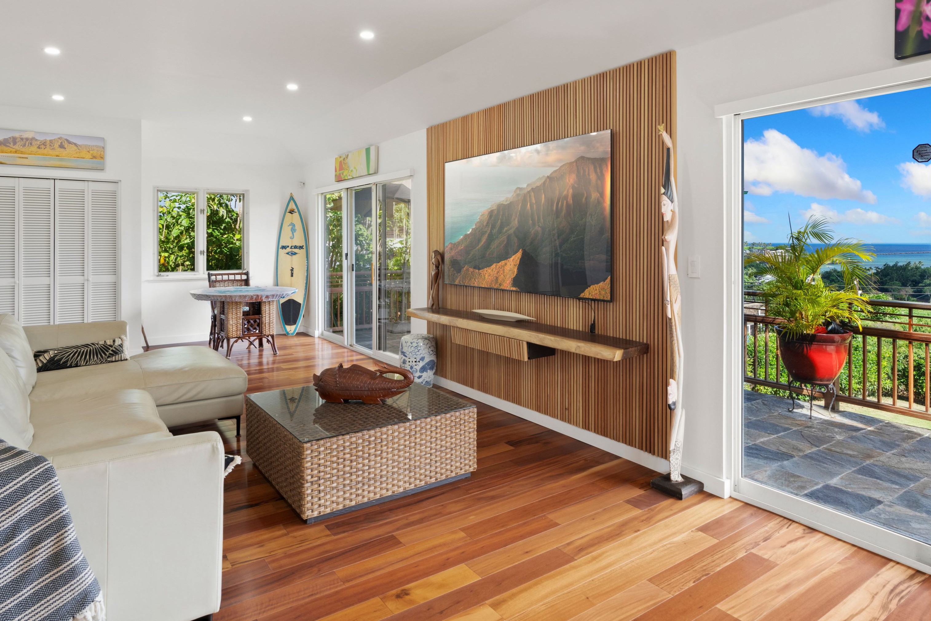 2938 Mokoi Street Lihue, HI 96766 - Photo 23 of 30 a living room with furniture and a flat screen tv