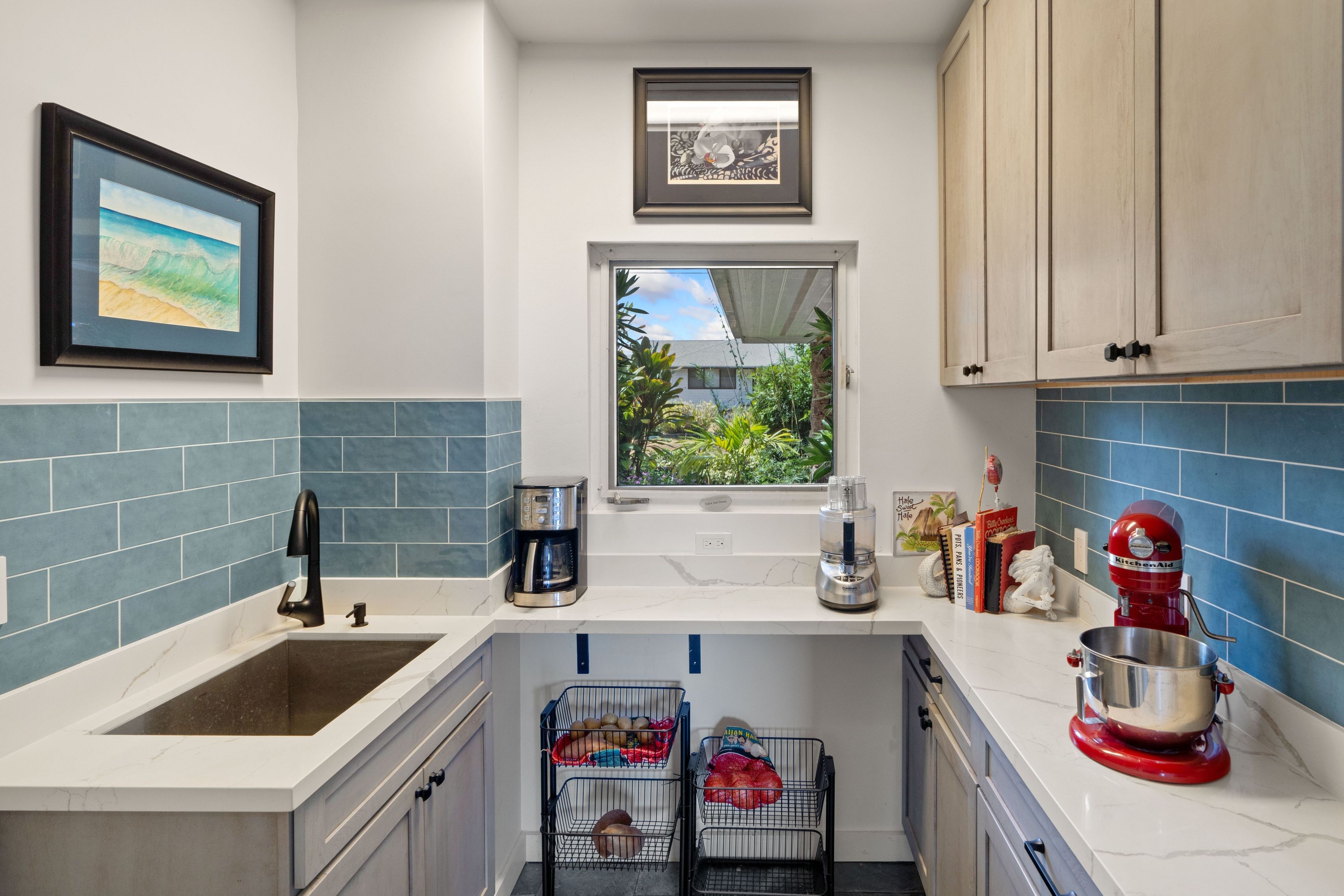 2938 Mokoi Street Lihue, HI 96766 - Photo 10 of 30 a kitchen with a sink and cabinets