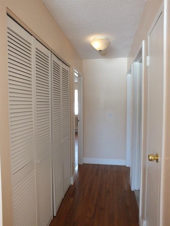 93 Kent Court, Unit 93 Meriden, CT 06450 - Photo 15 of 27 a view of a room with wooden floor