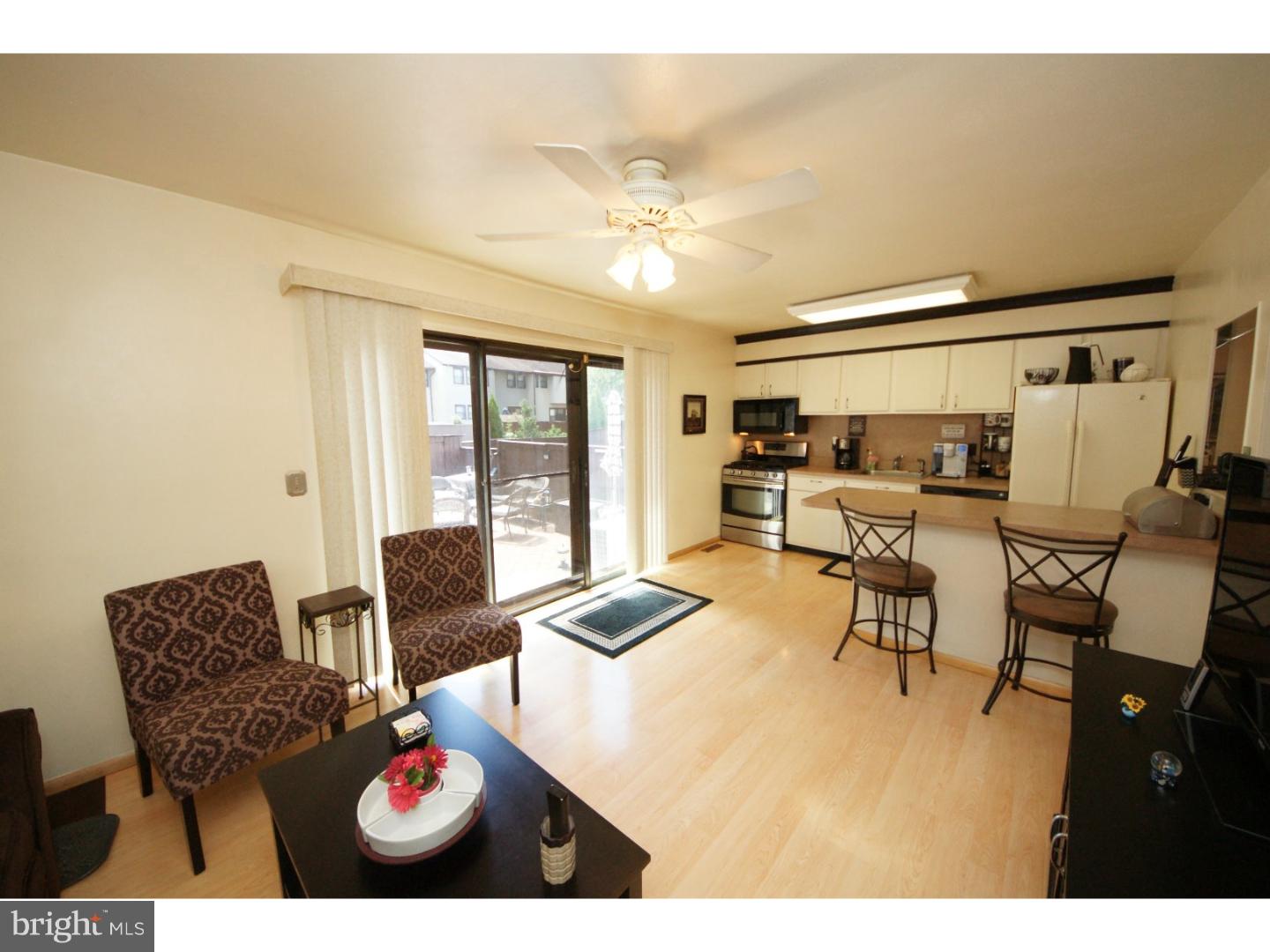 885 Jamestown Road East Windsor, NJ 08520 - Photo 11 of 25 a living room with furniture and a table