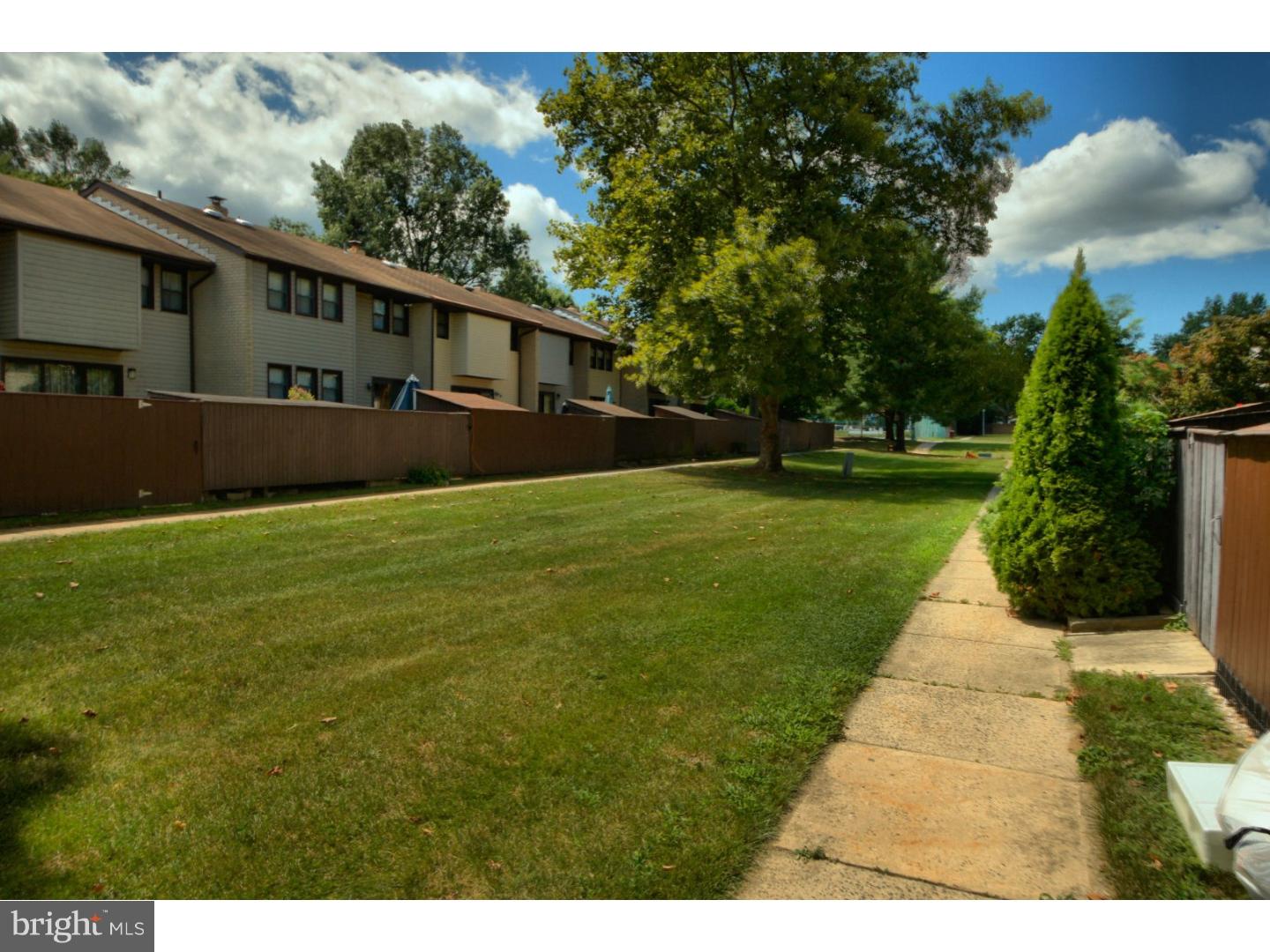 885 Jamestown Road East Windsor, NJ 08520 - Photo 25 of 25 a view of house with a yard