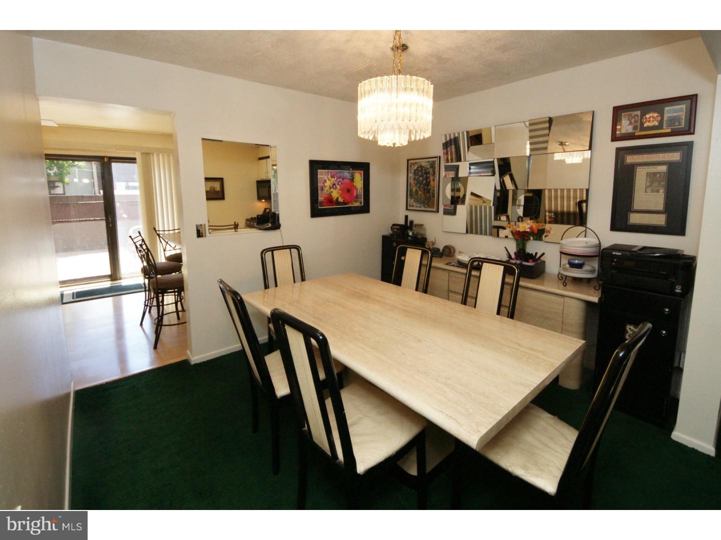 885 Jamestown Road East Windsor, NJ 08520 - Photo 6 of 25 a view of a dining room with furniture and wooden floor