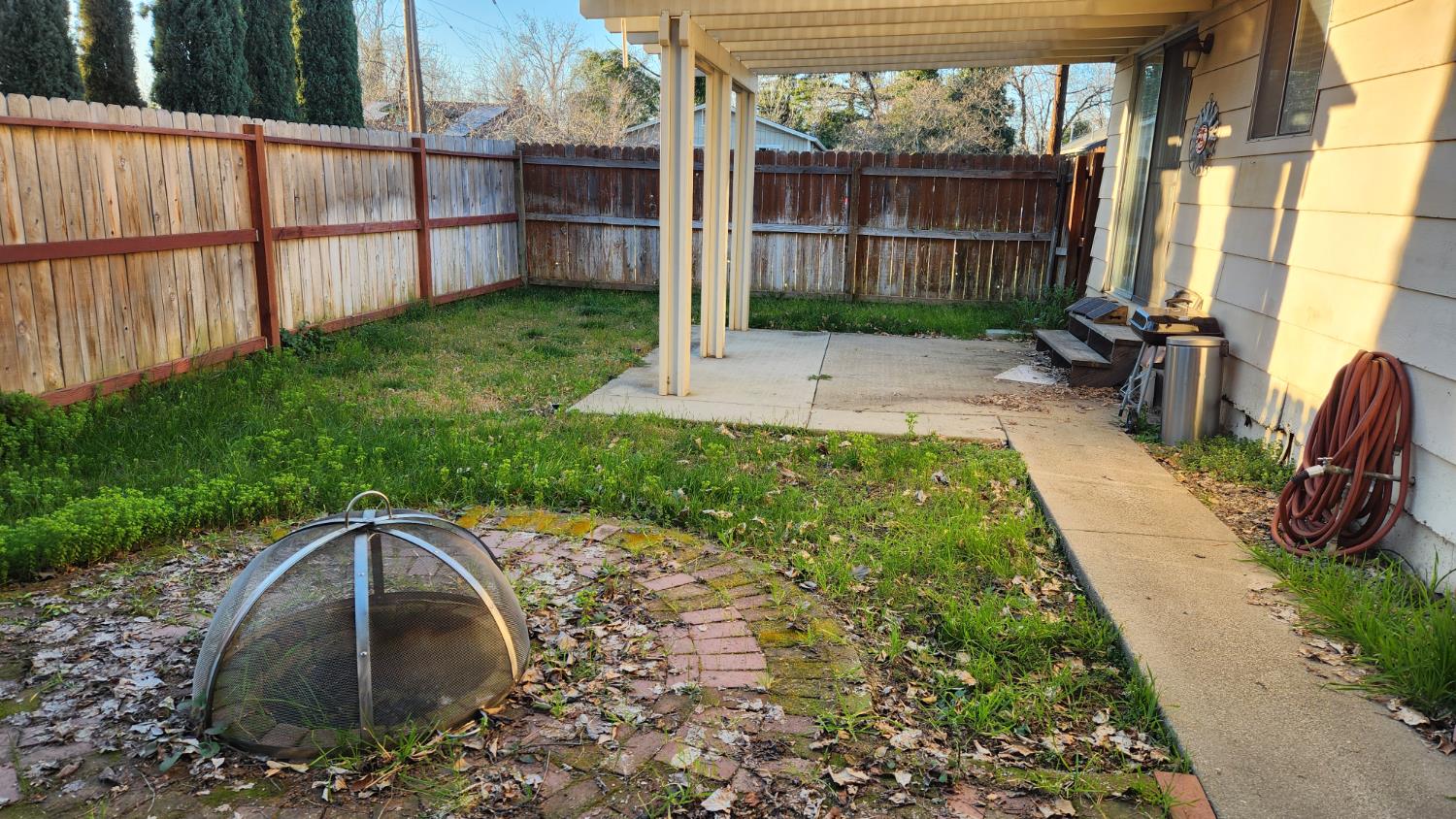 2786 Oak Street Anderson, CA 96007 - Photo 12 of 21 a view of backyard with outdoor seating and green space