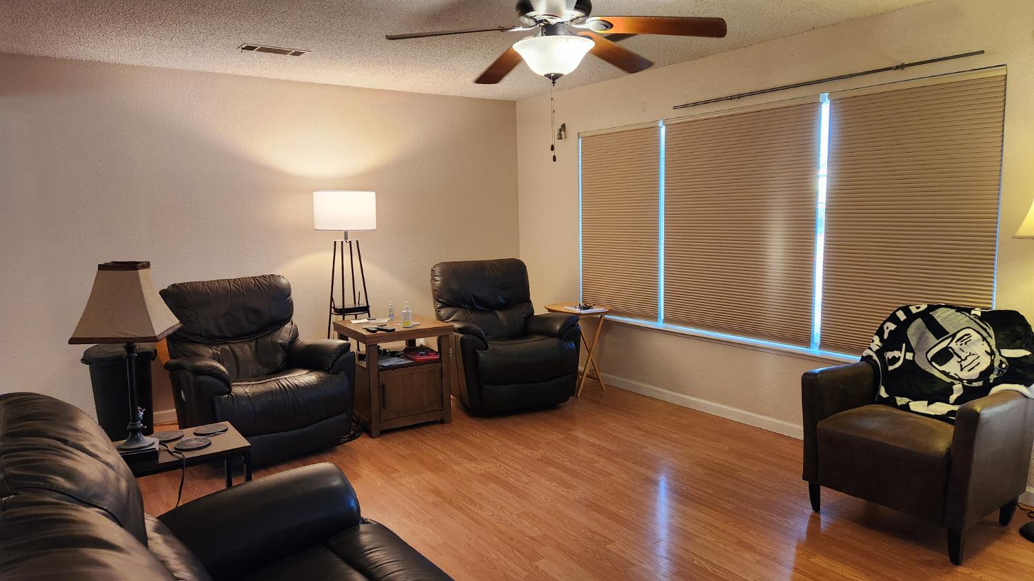 2786 Oak Street Anderson, CA 96007 - Photo 13 of 21 a living room with furniture and a lamp