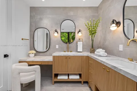 a view of a dining room with furniture wooden floor and a floor to ceiling window