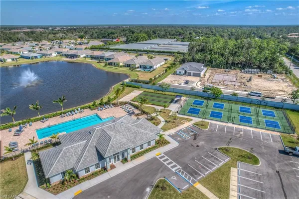 a view of house with yard and entertaining space