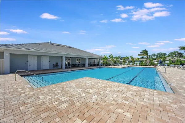 a view of a swimming pool and an outdoor space