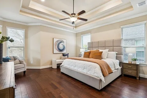 a bed room with bed and window