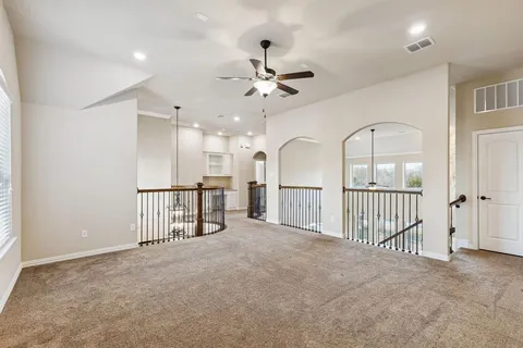 en view interior of a house with a ceiling fan