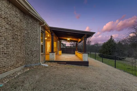 a view of house with outdoor space