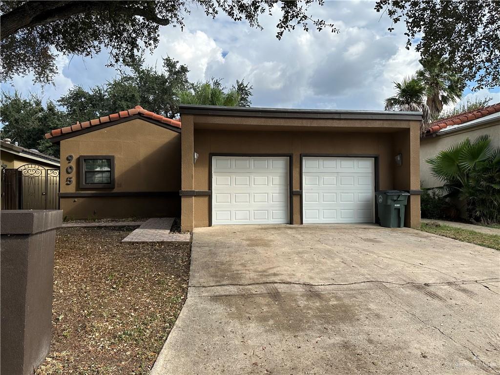 905 Colorado Court Mission, TX 78572 - Photo 2 of 42 a house with trees in the background