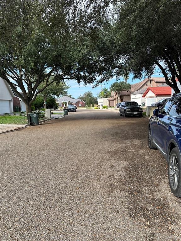 905 Colorado Court Mission, TX 78572 - Photo 4 of 42 a car parked in front of a house and a car parked