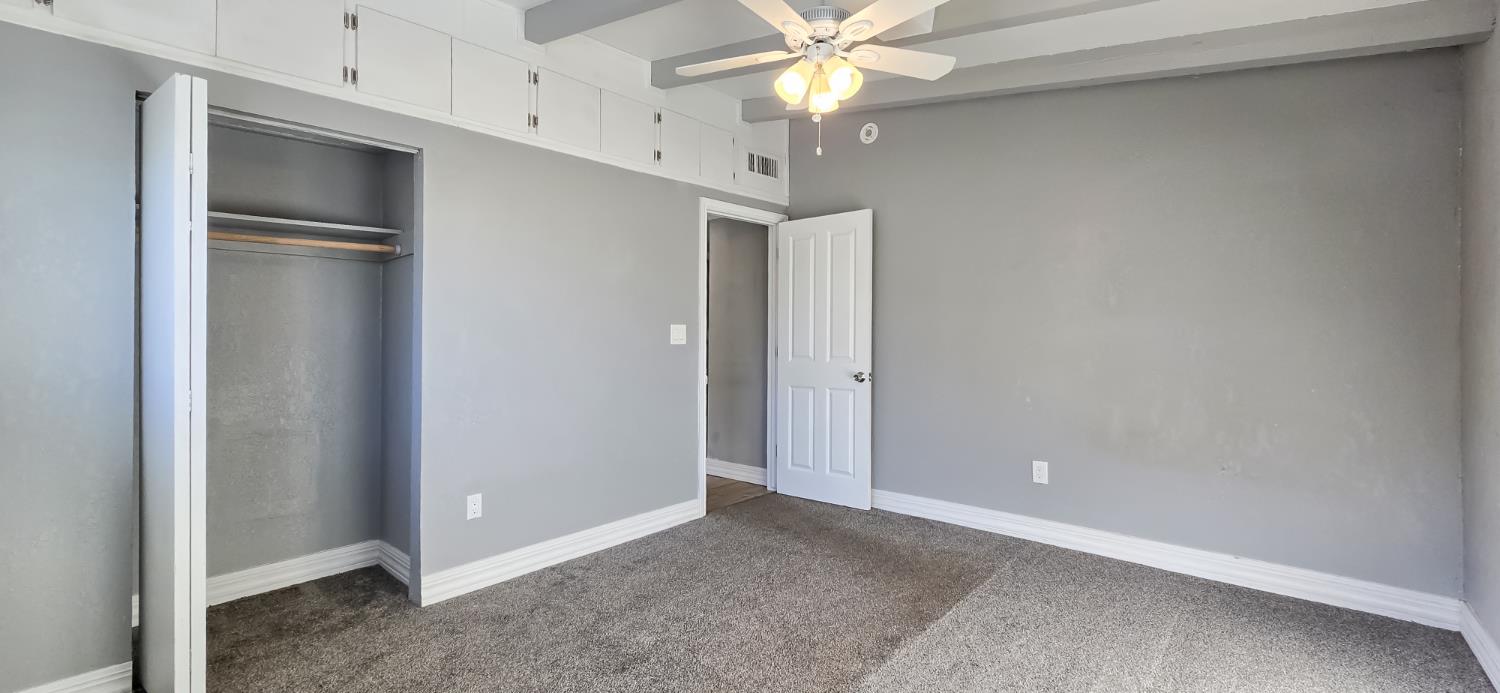206 West 20th Street Tracy, CA 95376 - Photo 17 of 20 a view of an empty room with a ceiling fan