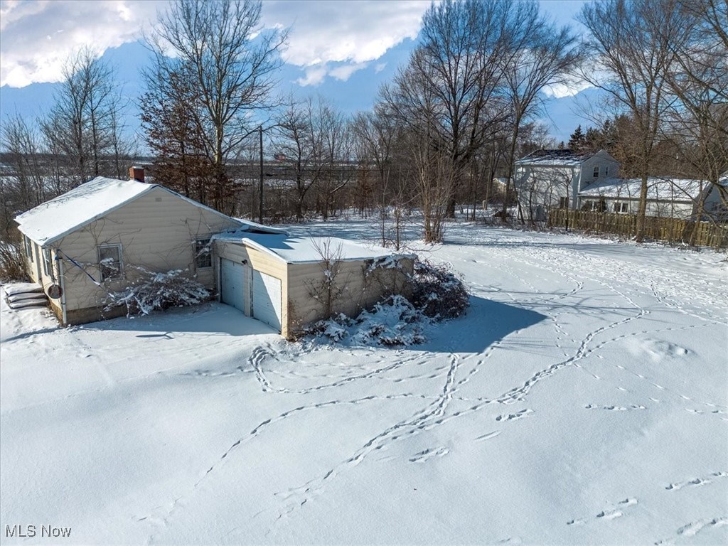 23070 Alexander Road Oakwood, OH 44146 - Photo 6 of 8 Yard with a garage