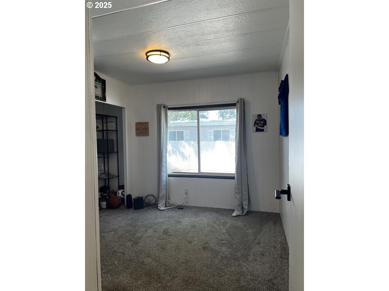 1255 Southwest Sandy Drive Hermiston, OR 97838 - Photo 12 of 16 a view of an empty room with a window