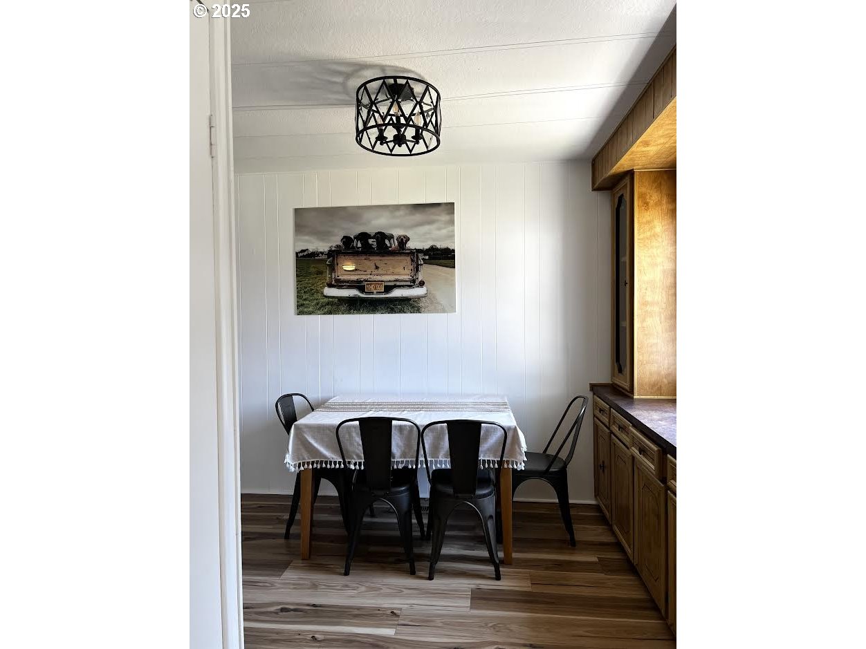 1255 Southwest Sandy Drive Hermiston, OR 97838 - Photo 6 of 16 a view of a hallway with furniture and a window