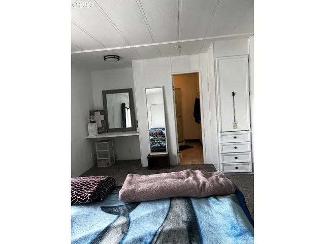 a living room with a couch and a stove