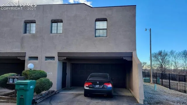 a car parked in front of a house