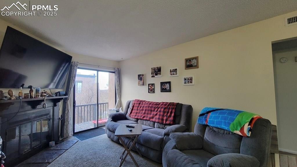 1925 Mohawk Road Pueblo, CO 81001 - Photo 11 of 13 a living room with furniture