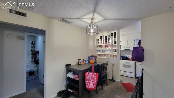 a room with furniture and musical instruments