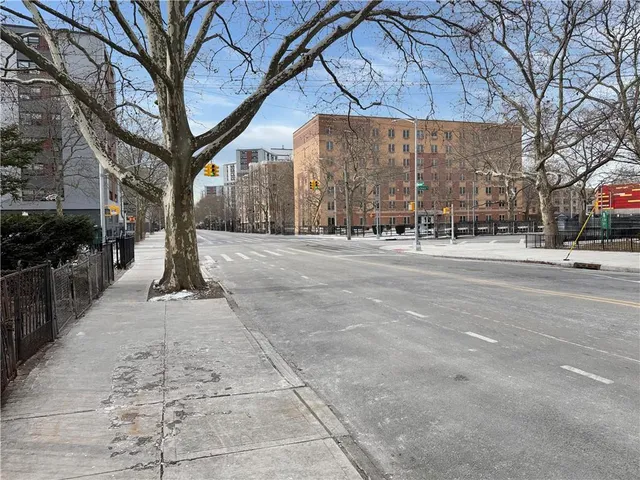 a view of road with a building