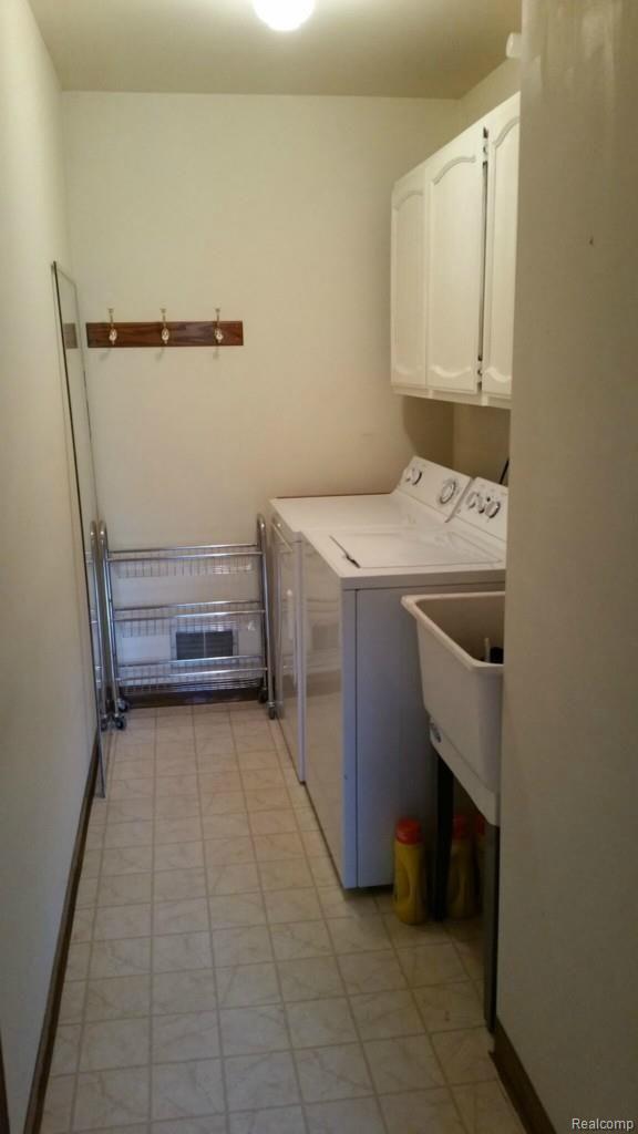 40357 Guilford Novi, MI 48375 - Photo 13 of 30 Laundry Room is shaped as an "L" which you'll find a nice mud room.