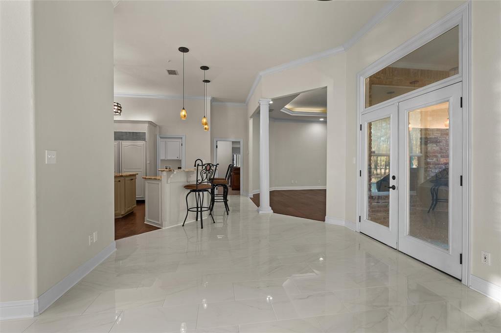2584 Butler Hill Road Benton, LA 71006 - Photo 12 of 33 a view of a livingroom with furniture and a table wooden floor