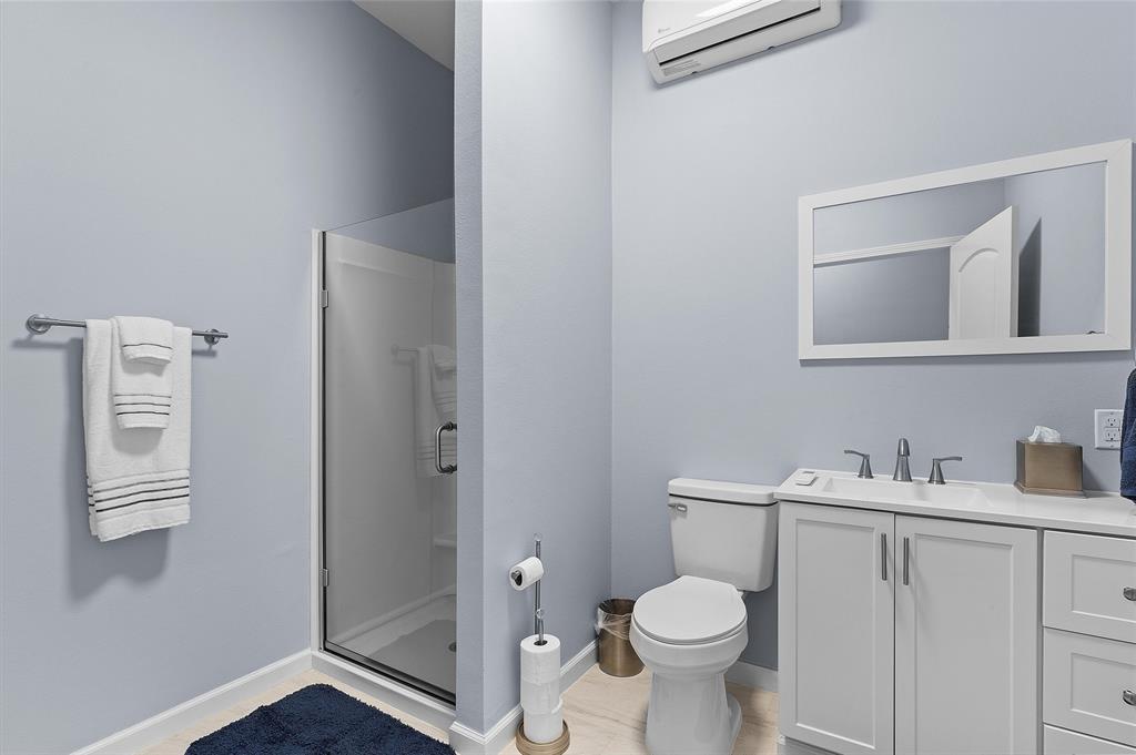 2584 Butler Hill Road Benton, LA 71006 - Photo 30 of 33 a bathroom with a toilet sink and shower