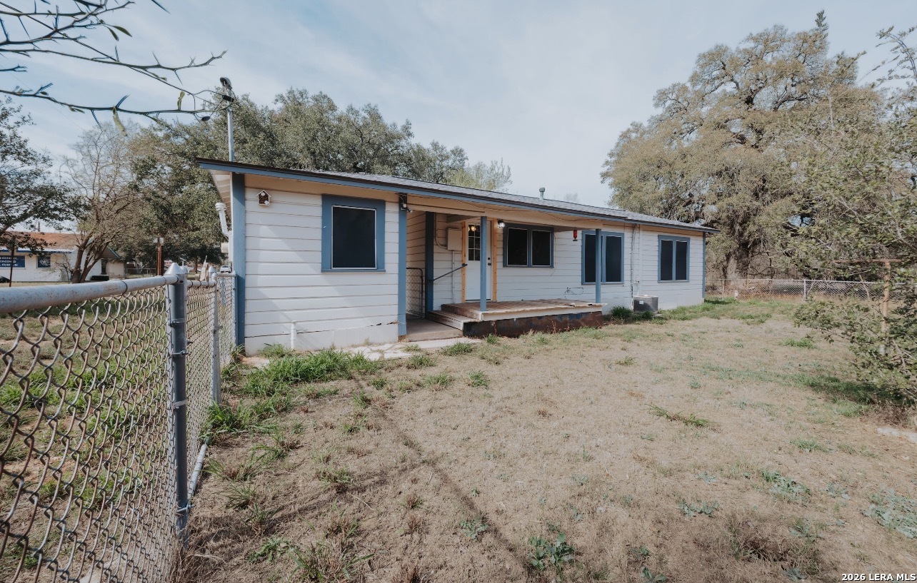 149 South Carroll Street Poth, TX 78147 - Photo 23 of 28 front view of a house with a yard