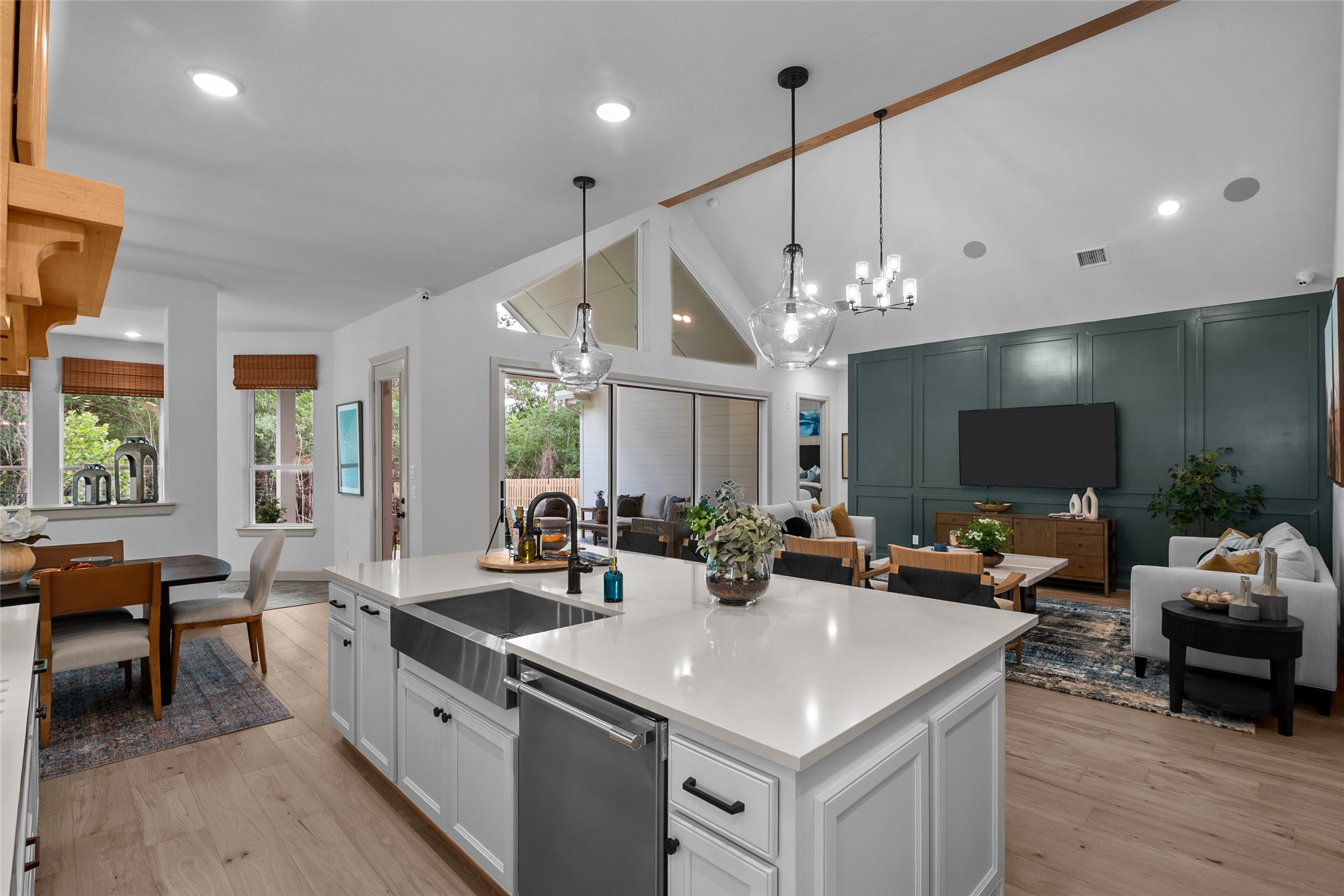 1760 Howler Way Montgomery, TX 77316 - Photo 12 of 44 REPRESENTATIVE PHOTO: Large island/breakfast bar opens to Living area and looks out to rear yard!