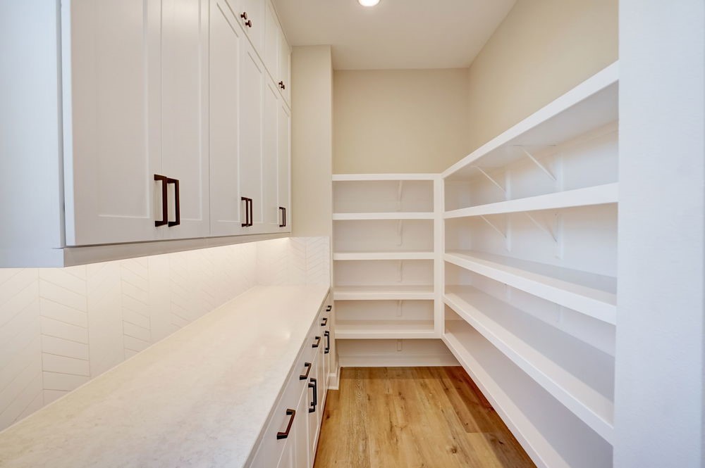 1760 Howler Way Montgomery, TX 77316 - Photo 15 of 44 REPRESENTATIVE PHOTO: HUGE walk in pantry/Butlers pantry.