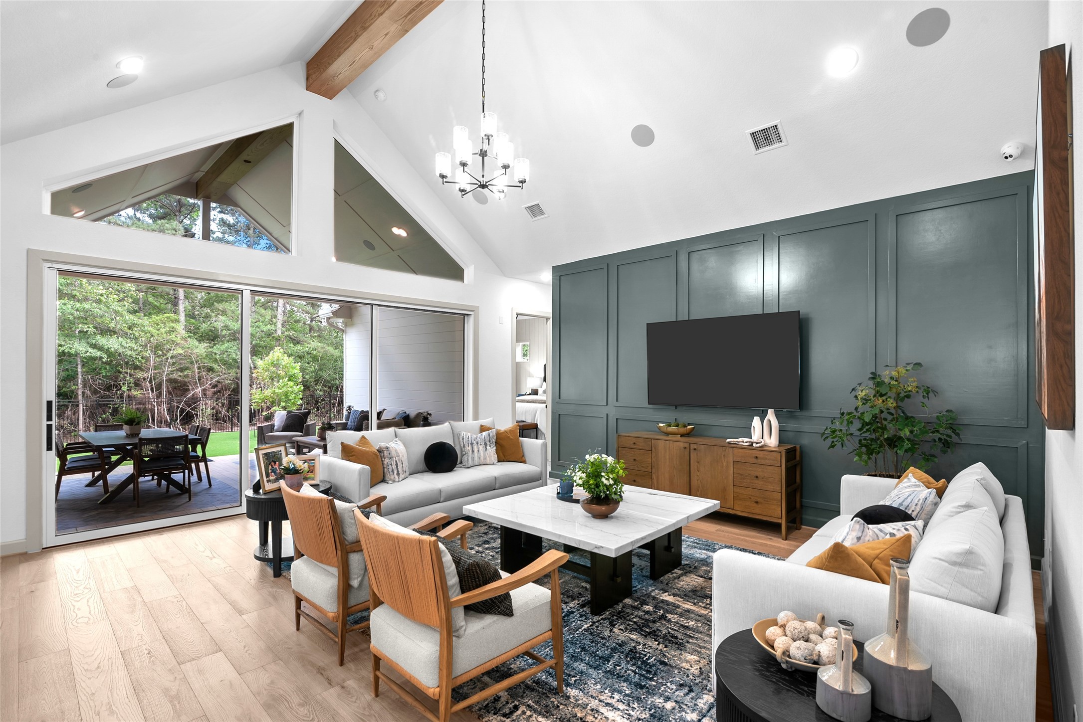 1760 Howler Way Montgomery, TX 77316 - Photo 19 of 44 REPRESENTATIVE PHOTO: Large Living with cathedral ceiling, trapezoid windows over stacking sliding glass doors that brings the outside in! Beam optional.