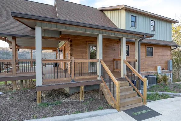 a view of entryway with wooden floor