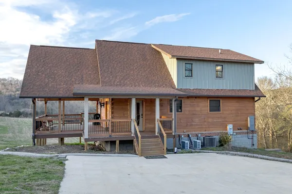 a view of a porch with wooden floor