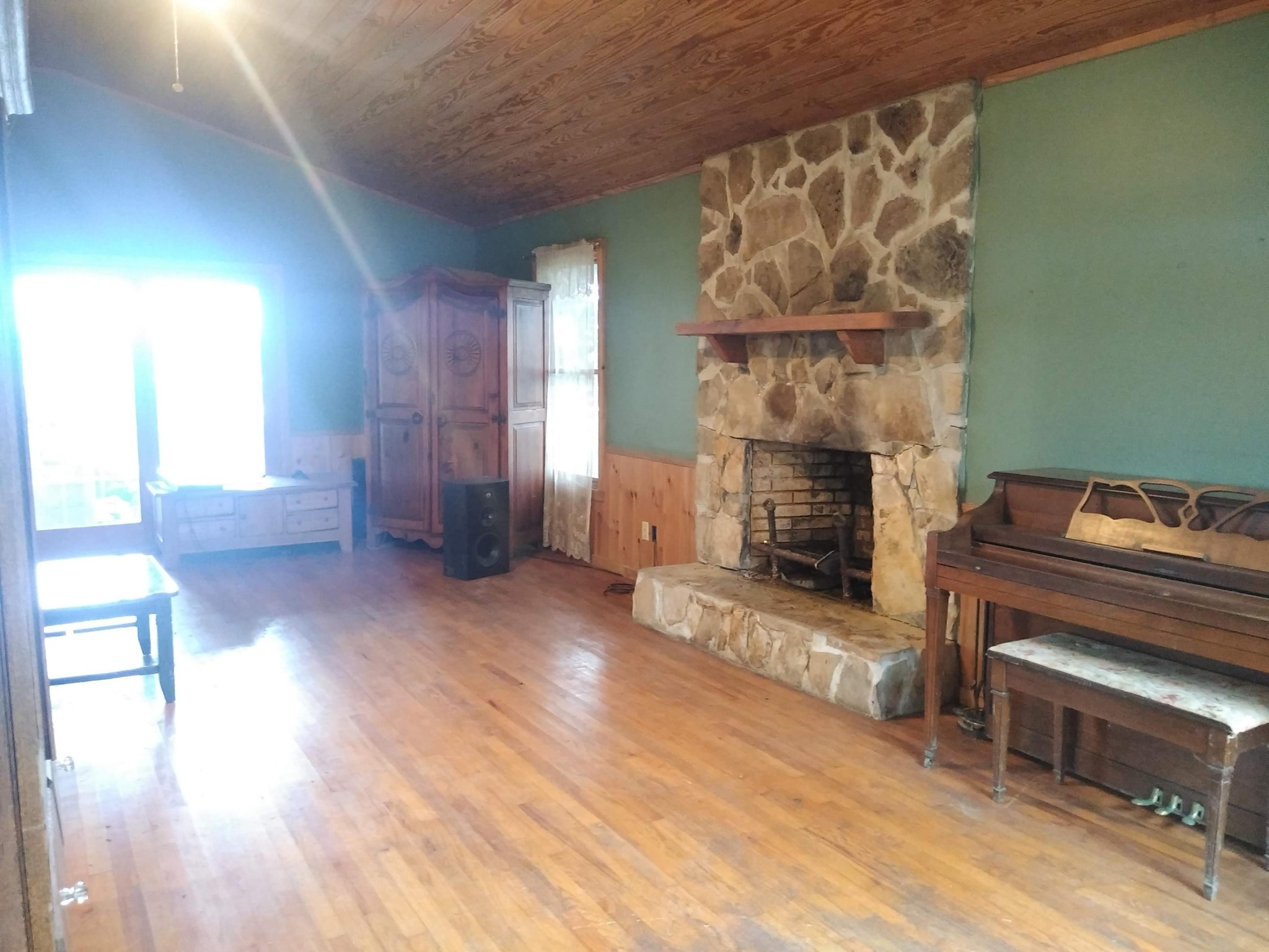 10820 Roberson Spring Road Loudon, TN 37774 - Photo 6 of 8 a living room with furniture and a fireplace