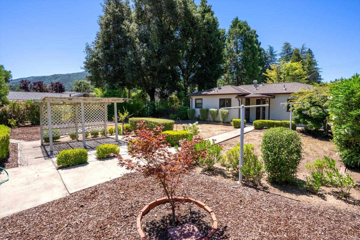 16899 Kennedy Road Los Gatos, CA 95032 - Photo 34 of 61 a view of a house with patio