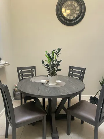 a view of a dining room with furniture