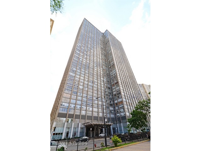 655 West Irving Park Road, Unit 1707 Chicago, IL 60613 - Photo 1 of 14 a view of a tall building