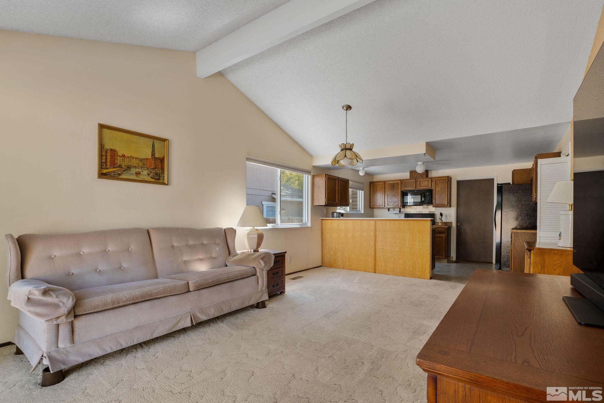 4315 Mendocino Lane Reno, NV 89502 - Photo 11 of 31 a living room with furniture and kitchen view