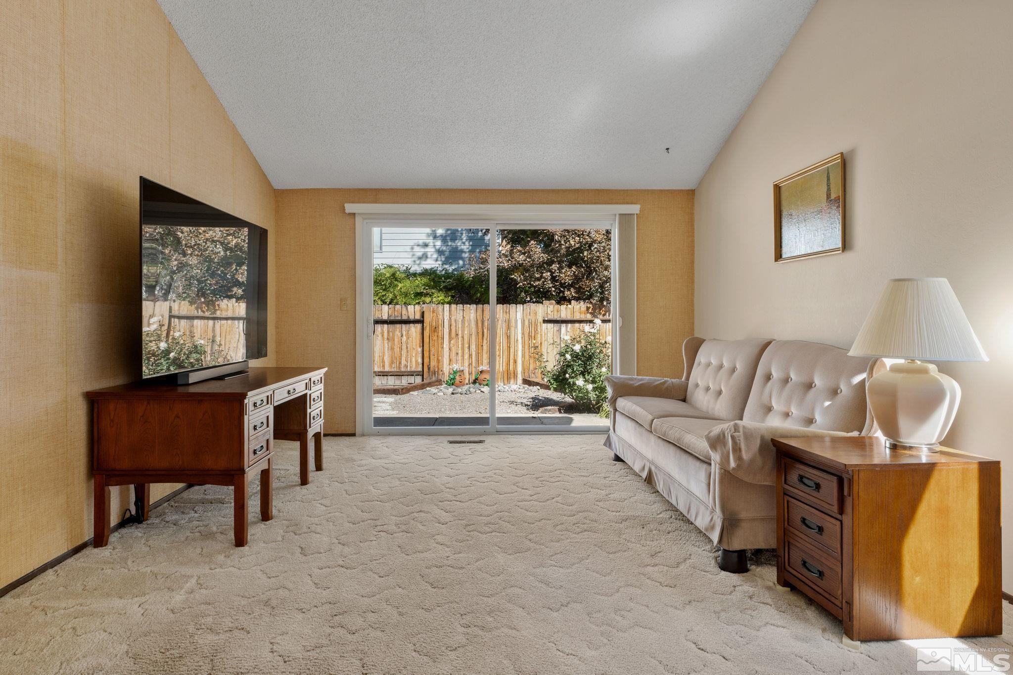 4315 Mendocino Lane Reno, NV 89502 - Photo 13 of 31 a living room with furniture and a window