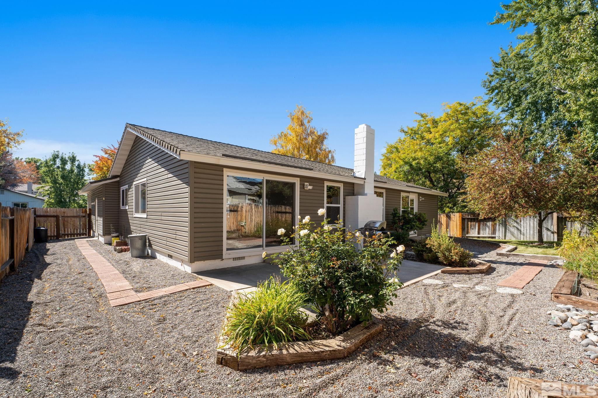 4315 Mendocino Lane Reno, NV 89502 - Photo 28 of 31 a view of a house with backyard and sitting area