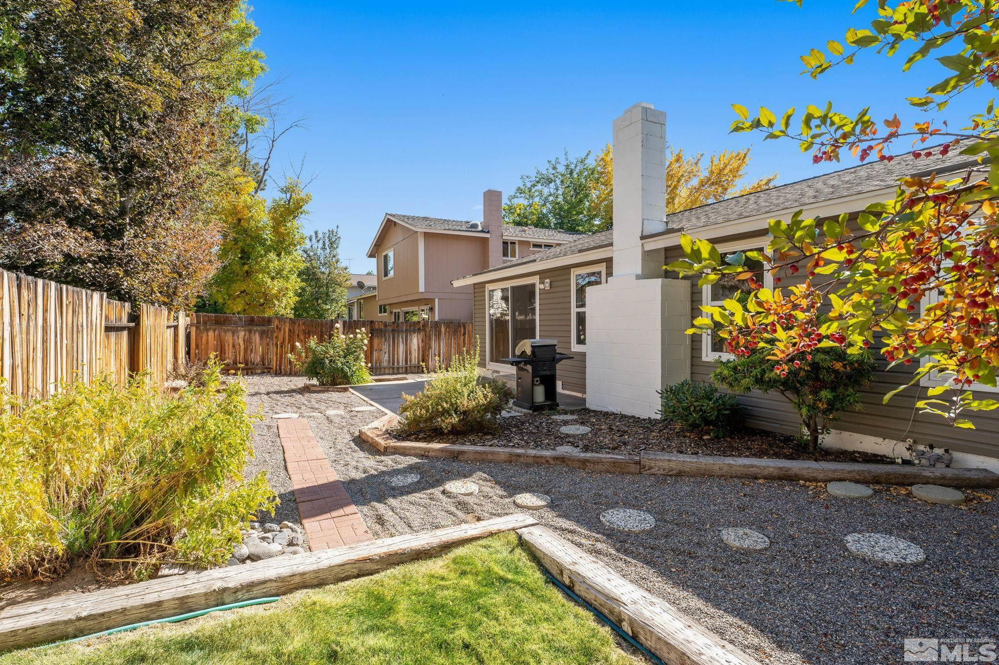 4315 Mendocino Lane Reno, NV 89502 - Photo 30 of 31 a front view of a house with garden